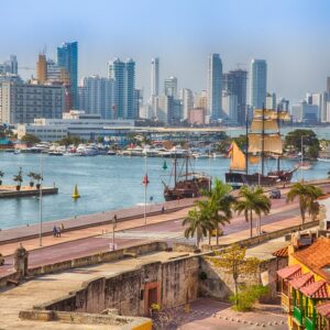 Cartagena Colombia - February 23 2014 - View of the Plaza San Pedro Claver with the Towers of Bocagrande in the background. The early morning calm before the shops open for business.